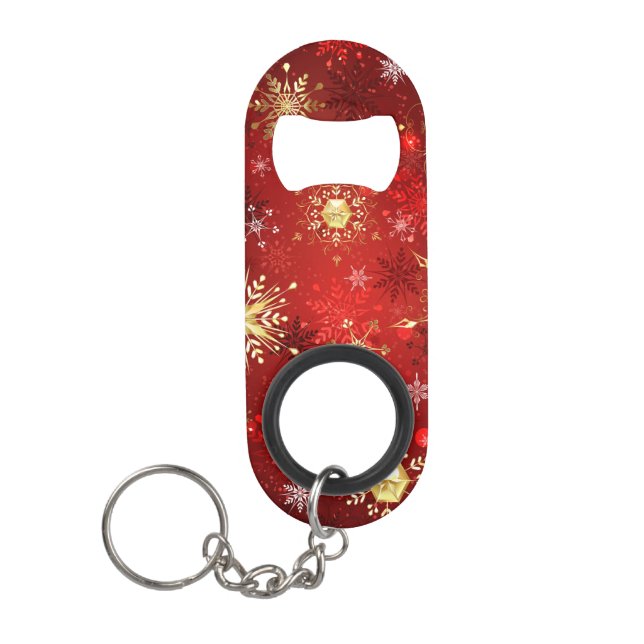 Abrebotellas De Llavero Navidades Copos de nieve dorados con fondo rojo (Anverso)