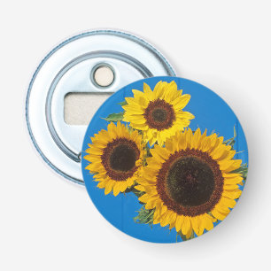Abrebotellas Girasoles contra cerca azul