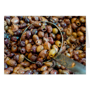 Aceitunas negras de leccino, posadas y acondiciona