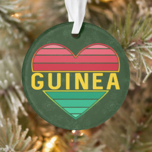 Adorno Amo Guinea, el corazón guineano