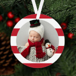 Adorno Baby First Christmas Modern Red Stripes Photo<br><div class="desc">This stylish two-sided holiday photo keepsake ornament features a newborn photo framed by a rich red and white striped background pattern. The back of the ornament includes "My First Christmas" wording with snowflake accent and custom text for the baby's full name and the year.</div>