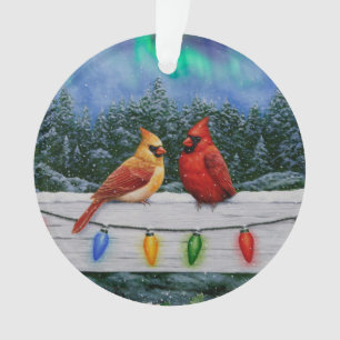 Adorno Cardenales y Navidades iluminan la nieve de invier
