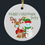 Adorno De Cerámica 2021 Merry Christmask Reindeer Quarantine<br><div class="desc">This design may be personalized in the area provided by changing the photo and/or text. Or it can be customized by clicking Personalize this Template and then choosing the click to customize further option and delete or change the color of the background, add text, change the text color or style,...</div>