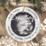 Adorno De Cerámica 2 Foto Bebé Ultrasonido Padres nuevos Faux Marble<br><div class="desc">Celebre el precioso regalo de su nuevo miembro de la familia con un elegante adorno de cerámica redonda de dos fotos. El diseño neutro de género es adecuado para un niño o chica de recién nacido. El texto y las imágenes de esta plantilla son fáciles de personalizar y pueden ser...</div>