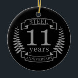 Adorno De Cerámica Acero Undécimo aniversario boda 11 años<br><div class="desc">Un diseño para celebrar 11 años de matrimonio. Este diseño tiene un diseño de laurel de color gris (acero) sobre un fondo negro. El acero es el regalo tradicional para esta ocasión. El texto dice el aniversario de Steel 11 años. Un diseño romántico para celebrar tu undécimo año de matrimonio....</div>