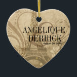 Adorno De Cerámica Arena de la boda de la torre Eiffel de Fleur de<br><div class="desc">Este "Fleur ornamento en forma de corazón bonito del de París" es el adorno perfecto para su primer árbol de navidad o como regalo del favor a sus huéspedes del boda. Utilice el "personalizar anaranjado él" botón arriba para personalizar este ornamento con su propio texto y foto. Hay varios productos...</div>