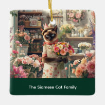 Arreglo floral de Navidades de gato por periódico