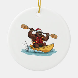 Adorno De Cerámica Bigfoot Sasquatch en kayak de Navidad deporte acuá
