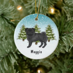 Adorno De Cerámica Black Pug Cute Cartoon Dog Snowley Winter Forest<br><div class="desc">El original ilustracion personalizado de Destei de un lindo perro de raza Pug color abrigo negro. El perro es colocado en una escena invernal con tres abetos verdes y la caída de la nieve. El fondo es un degradado de azul a blanco que da al diseño ese aspecto frío del...</div>