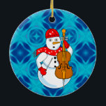 Adorno De Cerámica Cello Snowman<br><div class="desc">Un muñeco de nieve con bufanda de notas musicales y un violonchelo es un divertido diseño musical para músicos de cuerdas en cuartetos de orquesta y cuerdas.</div>