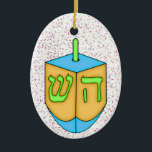 Adorno De Cerámica Chanukah Dreidel<br><div class="desc">Diviértete con esto. ¡Piensen en los temas! Juega con colores de fondo, agrega o elimina texto, y (por un poco de cargo adicional) personalizar la parte posterior con imágenes, color, tu logotipo / información comercial., etc.! También son excelentes para regalos o para usar como toque final de clase en su...</div>