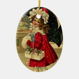 Adorno De Cerámica Chica que lleva un regalo del navidad