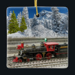 Adorno De Cerámica Christmas Vintage Train with Winter Snow<br><div class="desc">This vintage train on railroad tracks was designed from a photograph. This photo has a snowbank and mountain ridge overlay. If your guy loves trains then he will like this vintage train with winter landscape train for his Christmas tree. * Public domain graphics and photographs were used to create this...</div>