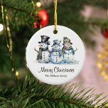 Adorno De Cerámica Clásico Feliz Navidad acuarela Snowman<br><div class="desc">Eleva la celebración de tus Navidades con nuestro adorno de cerámica festivo, adornado con una alegre familia de hombres de nieve y el reconfortante mensaje de 'Feliz Navidad'. Este adorno está diseñado para darle un toque de encanto festivo a su decoración de vacaciones, convirtiéndolo en el complemento perfecto para sus...</div>