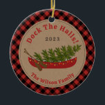 Adorno De Cerámica Colocar la foto del árbol de navidad del canoas de<br><div class="desc">Ilustracion de una canoa roja decorada con luces Navidades con árbol de Navidad adentro. El fondo es el material de color marrón con borde rojo y negro de manto de búfalo. Personalice el texto. Personalice la foto de atrás.</div>