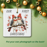 Adorno De Cerámica Cute Winter Bird First Christmas Template<br><div class="desc">Aquí hay un adorable adorno de plantillas para celebrar tu propia Navidad especial PRIMERA. El frente tiene una adorable imagen acuática de dos pájaros de invierno apiñados en una rama de bayas rojas cubierta de nieve. El texto gris de arriba abajo dice "Nuestra primera Navidad". La parte de atrás tiene...</div>