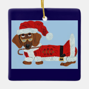 Adorno De Cerámica Dachshund Santa con un bastón de caramelo 