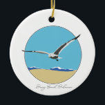 Adorno De Cerámica Dewey Beach, Gaviota de Delaware sobre la playa<br><div class="desc">El adorno de cerámica con una imagen de gaviota marina bidimensional sobrevolando la playa con olas. Dewey Beach,  Delaware en la parte inferior.</div>