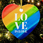 Adorno De Cerámica El amor es amor corazón del orgullo gay arcoiris<br><div class="desc">El amor es el amor. Celebrar el amor, la igualdad y el mes del Orgullo de Junio. Este Ornamento del Orgullo es cardíaco y está decorado con rayas de arcoiris y una tipografía blanca de diseño sobre un fondo de arcoiris color agua rojo, naranja, amarillo, verde, azul y violeta. Acuarela...</div>