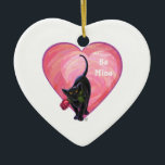 Adorno De Cerámica El día de San Valentín de gato negro<br><div class="desc">Desfile Animal Romántico Corazón de Gato Negro y Regalos de Amor, Tarjetas y Accesorios presenta nuestra divertida obra de arte de un gatito negro elegante sosteniendo a un rosa en su boca con el púrpura estratificado, rojo y el corazón rosado detrás. Este genial gato en diseño de amor es un...</div>