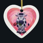 Adorno De Cerámica El día de San Valentín de vaca<br><div class="desc">Desfile Animal Romántico Cow Love and Hearts Valentine's Day Gifts and Accessories creado por Animal Parade. En esta obra de arte se ve la obra de una linda vaca blanca y negra sosteniendo a un rosa de bonito en la boca con los corazones púrpura, rojo y rosado sobre ella pintados...</div>