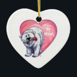 Adorno De Cerámica El día de San Valentín del oso polar<br><div class="desc">Desfile Animal Romántico de Oso Polar Amor y Corazones Regalos y Accesorios de San Valentín presenta nuestra divertida obra de arte de un lindo oso polar sosteniendo a un rosa bonito en la boca con el púrpura estratificado, rojo y el color rosado detrás de ella creada por nuestro talentoso artista,...</div>