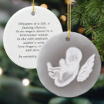 Adorno De Cerámica En recuerdo de Miscarro Poema Nieve Ángel<br><div class="desc">Un bello regalo para recordar a un ángel pequeño. Con una gráfica de ángel de nieve ilustrada a mano y un sincero poema en la espalda,  estos adornos hacen regalos reflexivos.</div>