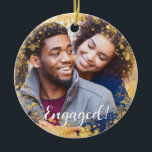 Adorno De Cerámica Festive Christmas Holidays Engaged Photo<br><div class="desc">Turn your engagement into a sweet memory with this festive ornament that features a border with illuminated snowflakes. A photo of the engaged couple covers the entire background. The word "Engaged" adds a fun and cozy touch to the design. The back includes the couples name and the engagement date. This...</div>