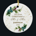 Adorno De Cerámica First Christmas as Mr & Mrs Winter Inspirational<br><div class="desc">Elegant "Our First Christmas as Mr & Mrs" personalized Wedding ceramic ornament depicts simple watercolor evergreen branches adorned with holly leaves,  red berries and gold splashes. The back features inspirational quote,  "Two lives united in friendship,  Two friends united in love,  One love united in Christ."-</div>