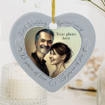 Adorno De Cerámica Foto del 25° aniversario del Boda<br><div class="desc">Celebra 25 años de matrimonio con un adorno especial de fotos de personalizados en un encantador marco de forma cardíaca. Simplemente suba tu propia foto de la pareja casada y aparecerá en el corte. El surround de color gris plateado incluye una fuente de guión y decoraciones. (Tenga en cuenta que...</div>