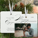 Adorno De Cerámica Fotografía y caligrafía elegantes con mucho y much<br><div class="desc">Ornamento de fotos para Navidades Merry & Engaged que usted puede personalizar con su foto favorita y su texto personal. Diseño tipográfico elegante con caligrafía rápida y fácil de editar para una pareja comprometida. Este adorno vacacional está escrito con Merry & Engaged por un lado y texto editable por el...</div>