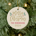 Adorno De Cerámica Fotos de la familia de Personalizados de la escrit<br><div class="desc">Elegante adorno navideño de Feliz Navidad con escritura antigua de oro y acentos de ramas verdes con hojas huecas y bayas rojas. Personalice con el nombre personalizado / la familia y el texto del año, y agregue una foto familiar favorita al lado opuesto. Se puede modificar el color de fondo...</div>