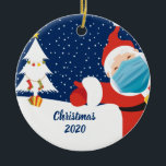 Adorno De Cerámica Funny Christmas Santa Claus in Face Mask<br><div class="desc">Funny Merry Christmas 2020 ornament with Santa Claus wearing a face mask to fight off Covid during the pandemic. Help to keep Kris Kringle safe during the Coronavirus quarantine by social distancing and wearing masks for your friends and family. Holiday humor gift featuring a beautiful navy blue winter sky and...</div>