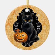 Gato negro dulce de Halloween y calabaza
