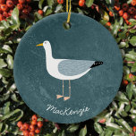 Adorno De Cerámica Gaviota personalizada<br><div class="desc">Una gaviota divertida frente al océano profundo y verde. Ideal para los amantes de los pájaros suaves y de la costa. Arte original de Nic Squirrell. Cambie el nombre a personalizar.</div>
