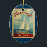 Adorno De Cerámica Halifax Ornament Sailboat Vintage Travel Canadá<br><div class="desc">Este diseño náutico de viajes vintage de Halifax Canada incluye un barco que navega en el agua con gaviotas y un cielo azul lleno de hermosas nubes blancas.</div>