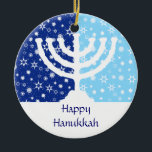 Adorno De Cerámica Hanukkah Menorah Ornament<br><div class="desc">El adorno perfecto para la familia interreligiosa. Una menorah Hanukkah se encuentra en un campo de estrellas y copos de nieve de color azul oscuro y claro. Su mensaje personalizado aparece a continuación. También se puede utilizar como ventilador,  gaviota o decoración de pared. Disponible con productos a juego.</div>