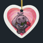Adorno De Cerámica Hippopótamo El día de San Valentín<br><div class="desc">Desfile Animal Romántico Hippo Love and Hearts Valentine's Day Gifts and Accessories creado por nuestro talentoso artista, Traci Van Wagoner presenta nuestra divertida obra de un lindo hipopótamo con un rosa de bonito en la boca. Nuestro divertido hipopótamo enamorado de los corazones púrpura, rojo y rosado en capas seguramente traerá...</div>