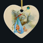 ADORNO DE CERÁMICA HISTORIA NIÑO DUCHA CORAZÓN MONOGRAMA AZUL SAPPHIR<br><div class="desc">Elegante, colorido, vibrante estilo vintage verde azulado diseño blanco azul con un bebé y cigüeña voladora y una brillante piedra en 3D de Bulgan Lumini (c). Fácil de personalizar con su propio texto para invitaciones guardar-la-fecha, gracias, duchas de bebé, fiestas de cumpleaños para niños, o casi cualquier evento que desee!...</div>