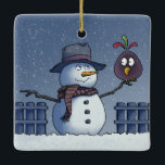 Adorno De Cerámica Hombre de nieve con pájaro<br><div class="desc">Hacer amigos en un país de maravillas de invierno. Que nieve - Saludos de temporada.</div>