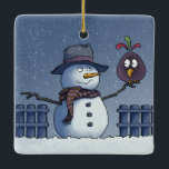 Adorno De Cerámica Hombre de nieve con pájaro<br><div class="desc">Hacer amigos en un país de maravillas de invierno. Que nieve - Saludos de temporada.</div>