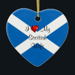 Adorno De Cerámica I Love My Scottish Wife<br><div class="desc">I Love My Scottish Wife,  heart-shaped Christmas ornament. VIRGINIA5050* - Creative and unusual gifts for all occasions at www.zazzle.com/virginia5050* INTERNATIONAL GIFTS at zazzle.com/InternationalGifts,  Florida Gift Store at zazzle.com/FloridaGiftStore*,  RETIREMENT GIFT STORE at zazzle.com/RetirementGiftStore,  I LOVE GIFT STORE at zazzle.com/ILoveGiftStore,  and BIRTHDAY GIFT STORE at zazzle.com/BirthdayGiftStore*</div>