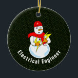 Adorno De Cerámica Ingeniero eléctrico Snowman<br><div class="desc">El texto editable de ingeniero eléctrico con un muñeco de nieve sosteniendo los relámpagos es un diseño humorístico de ingeniería eléctrica para ingenieros en cumpleaños,  graduaciones y vacaciones.</div>