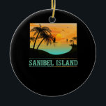 Adorno De Cerámica Isla Retro Sanibel Florida Tropical Sunset Beach<br><div class="desc">Con una puesta de sol y palmeras,  este diseño es el recuerdo perfecto de unas vacaciones relajantes en la isla de Sanibel.</div>