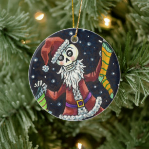 ADORNO DE CERÁMICA JINGLE BONES SANTA, VACACIONES SKELETON Y ALMACENA