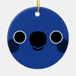 Adorno De Cerámica La cara de un Conure coronado por el azul