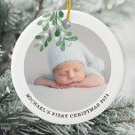 Adorno De Cerámica La primera foto navideña del bebé<br><div class="desc">Este primer ornamento de Navidad para bebés está decorado con mistletoe acuarela. Personalizable fácil con la foto,  nombre y año de su bebé. Utilice la Herramienta de diseño para cambiar el tamaño,  estilo o color del texto. Acuarela original © Michele Davies.</div>