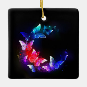Adorno De Cerámica Mariposas nocturnas de neón brillante sobre fondo 