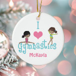 Adorno De Cerámica Me encanta la gimnasia como Chica afroamericano<br><div class="desc">Este adorable regalo de adoración navideña de I Love Gymnastics presenta a un pequeño chica negro y a un niño hispano bailando sobre las cartas. Un bonito dibujo de una gimnasta afroamericana.</div>