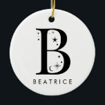 Adorno De Cerámica Monograma B Nombre celular<br><div class="desc">Añada un toque de magia celeste a su decoración navideña con este impresionante adorno navideño monograma. Con una carta adornada con pequeñas estrellas y lunas a su alrededor y su elección de nombre debajo, este adorno personalizado es el recuerdo perfecto para la temporada. Se puede ajustar cómodamente hasta 10 caracteres...</div>